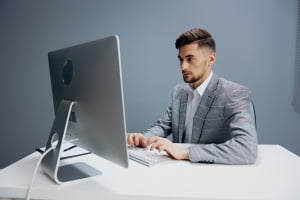 man using a refurbished computer