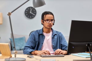 man in front of a refurbished computer in Omaha